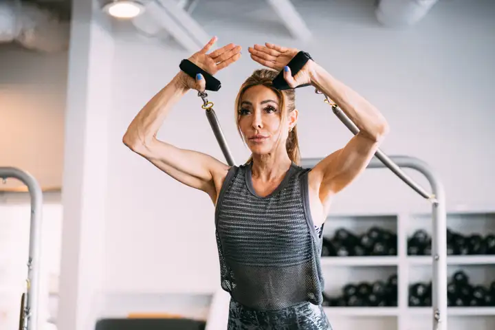 Woman at Bodybar pilates arm pilates workout