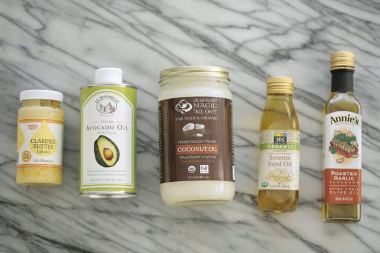 Here are five cooking oils: clarified butter, avocado oil, coconut oil, sesame oil, and roasted garlic olive oil.